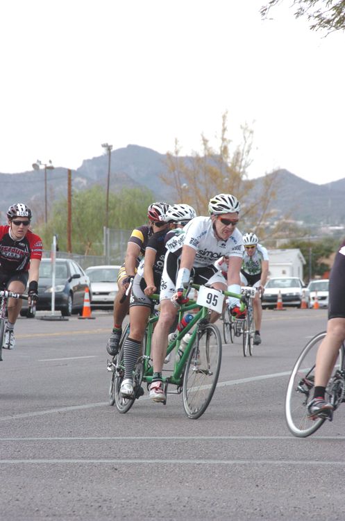 Mike and his riding partner racing el Tour de Tucson on their green tandem