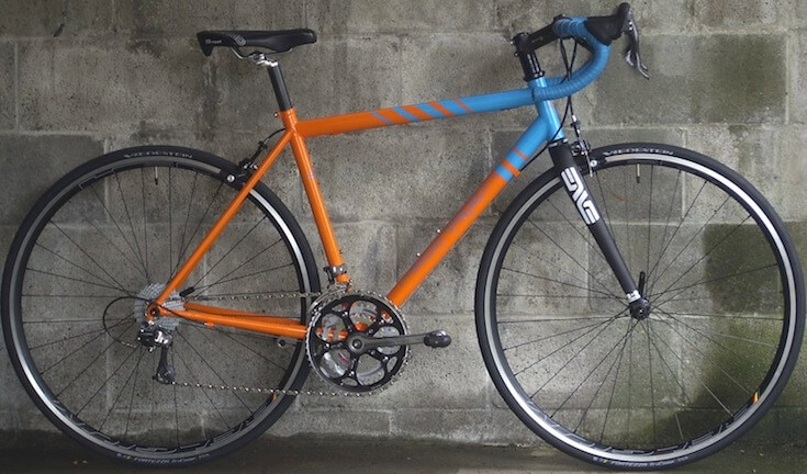 Orange and blue Rodriguez Outlaw light weight steel road bikes