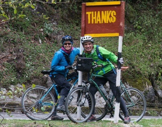 Couple riding their Rodriguez touring bikes in France